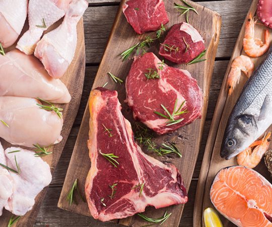 Assortment of meat and seafood . Beef , chicken , fish and pork